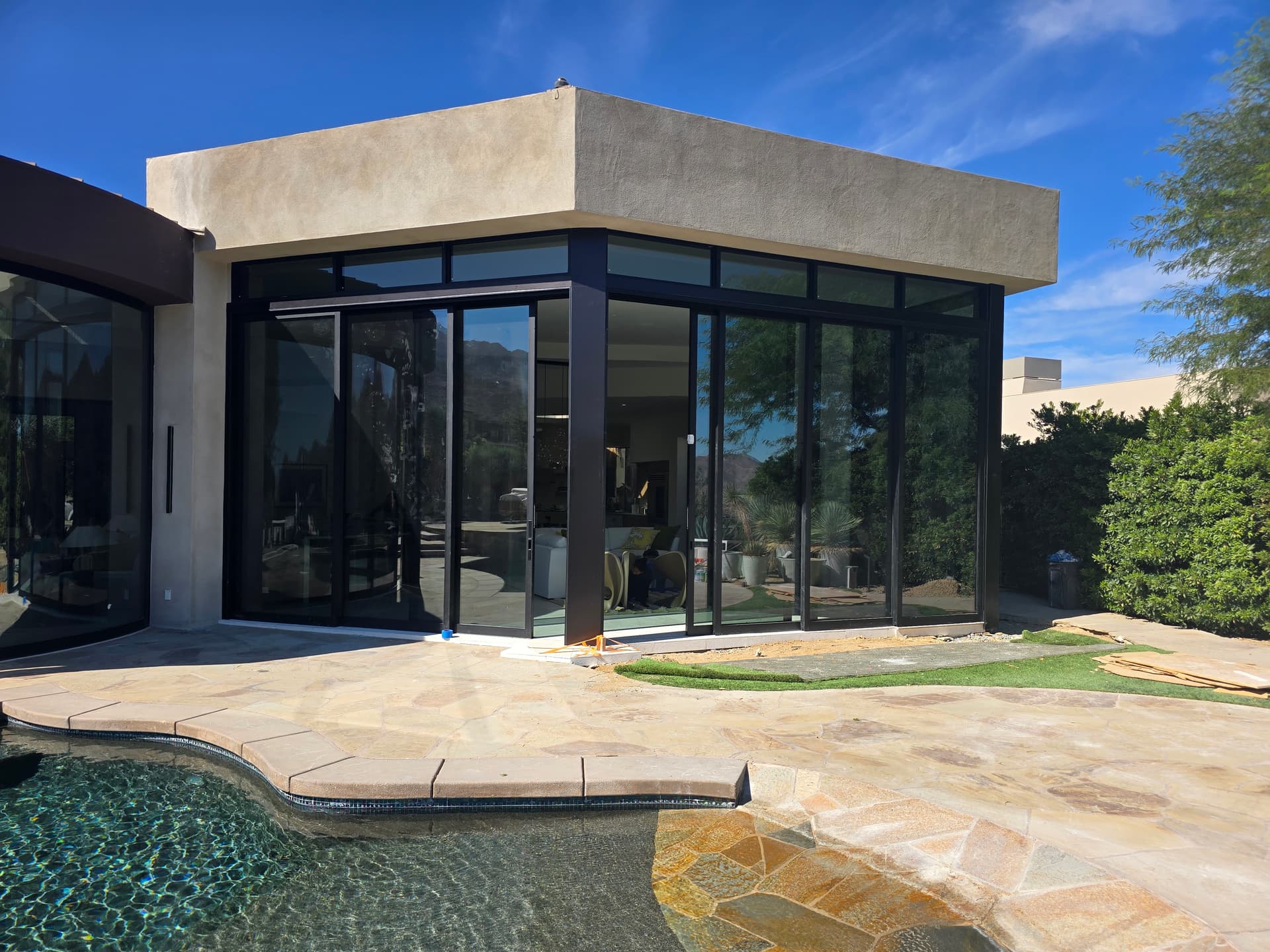 Mid-century modern wraparound sliding glass doors