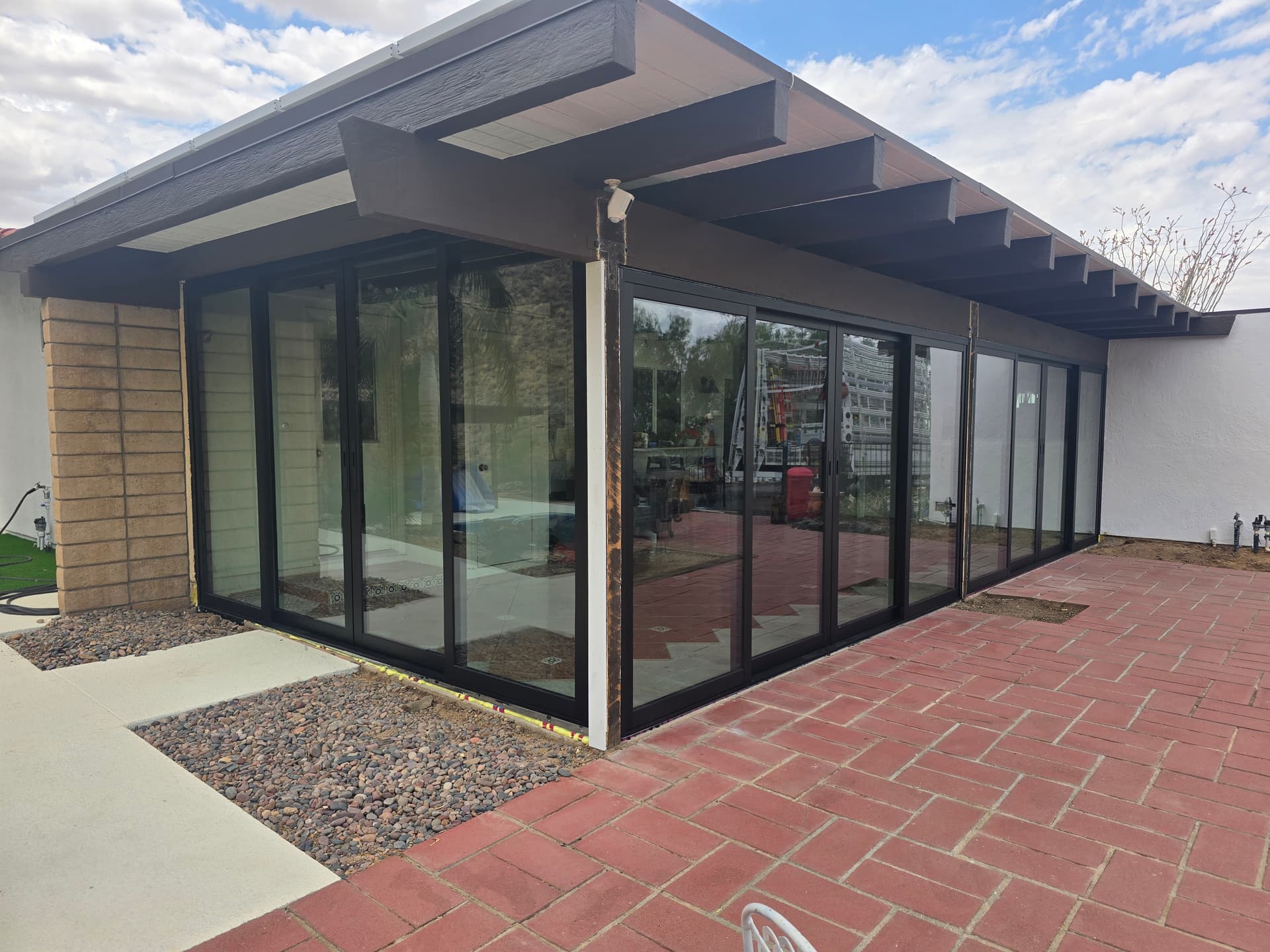 Black-framed glass wall system