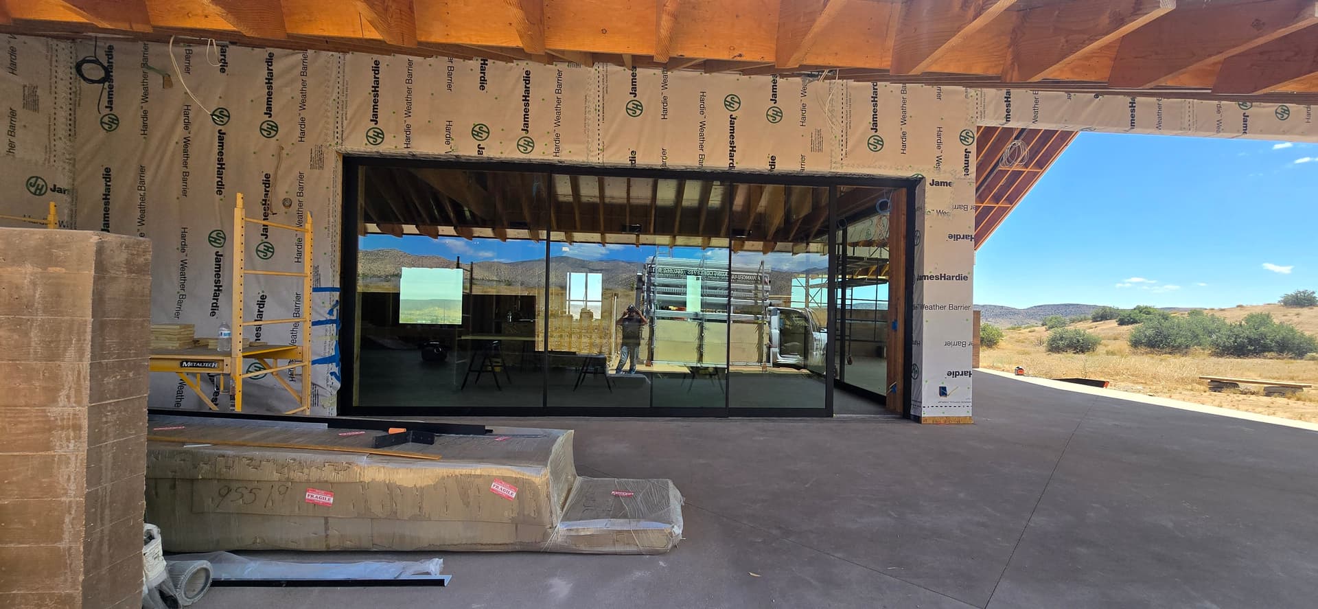 Floor-to-ceiling sliding glass wall