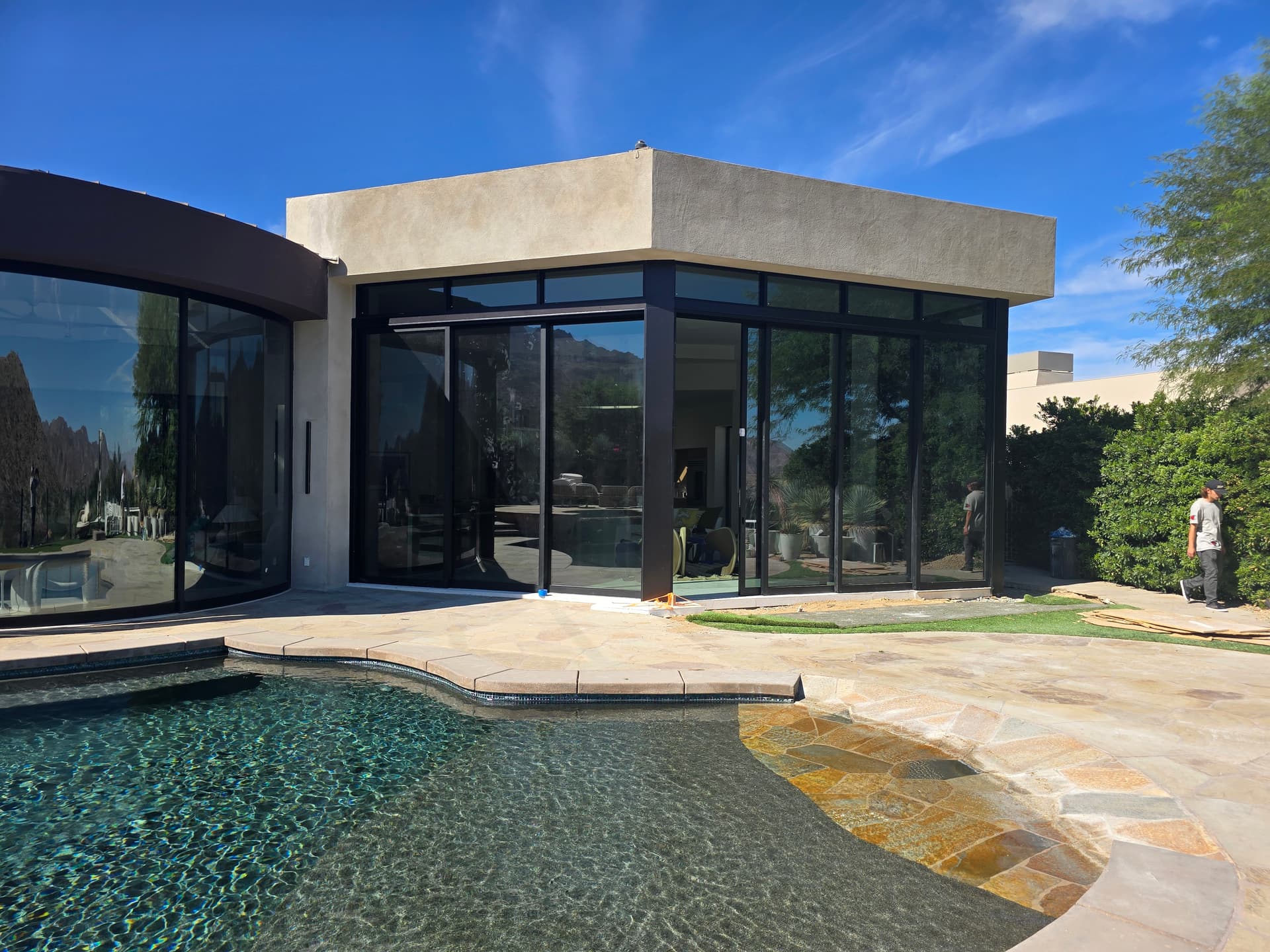 Exterior corner glass wall system poolside